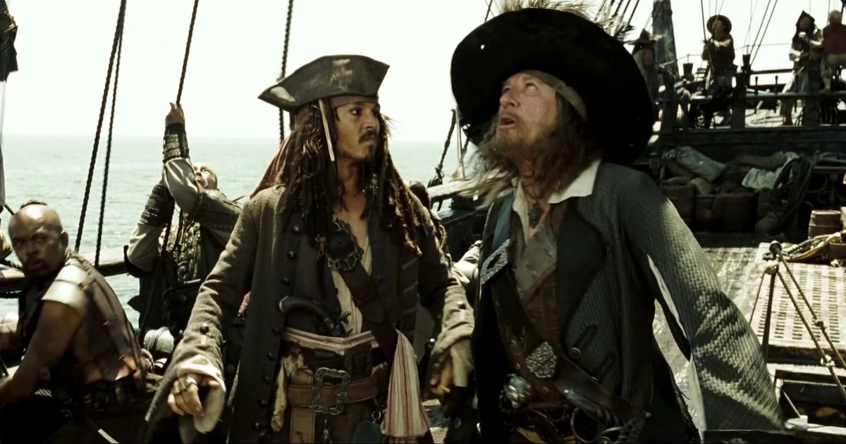 Johnny Depp and Geoffrey Rush in Pirates of the Caribbean