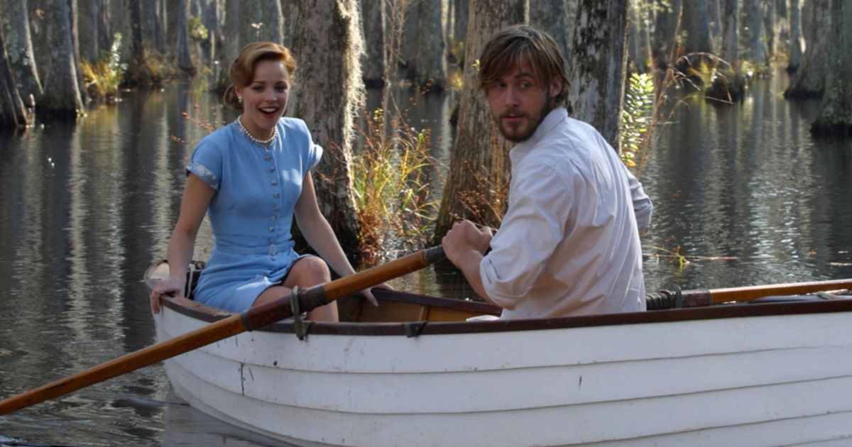 Ryan Gosling and Rachel McAdams in a rowboat in The Notebook