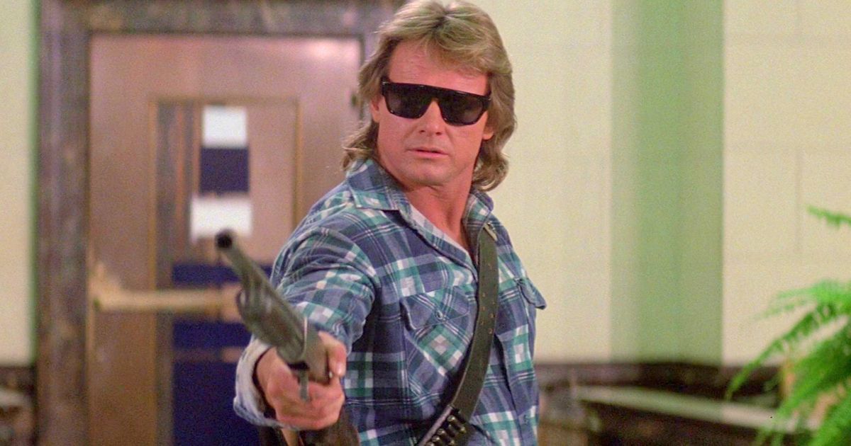They Live Roddy Piper holding a shotgun
