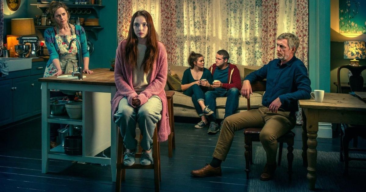 the cast of thirteen in a kitchen