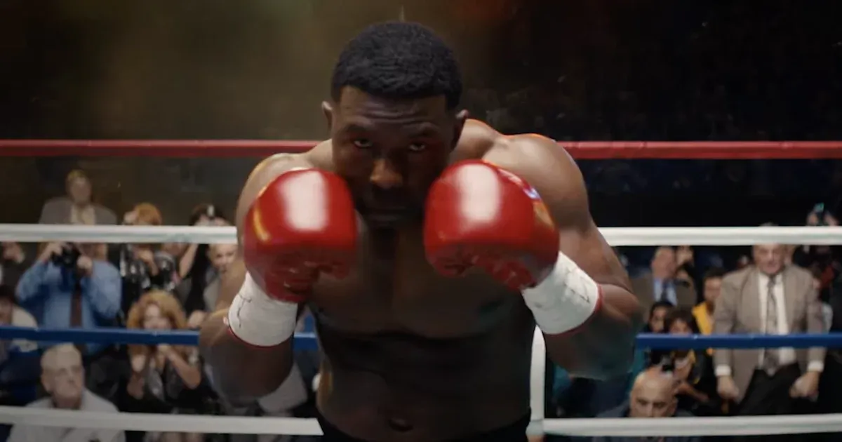 Boxer prepares to strike in ring