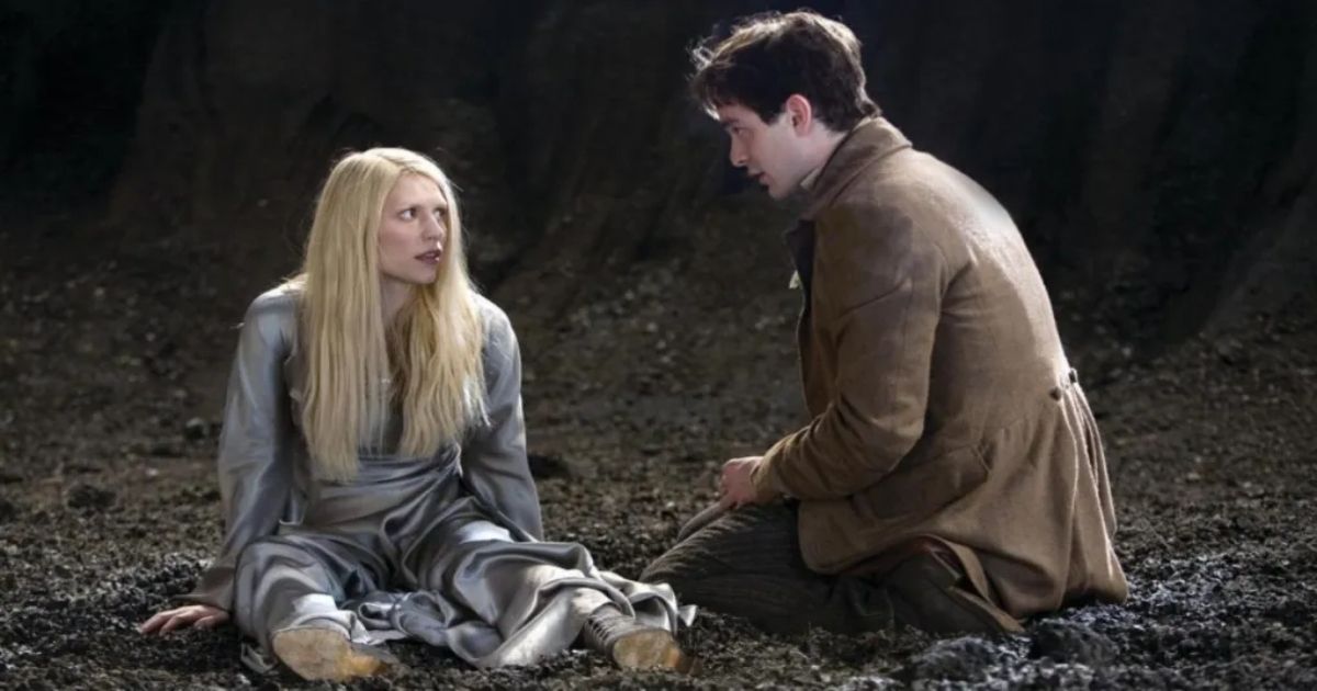 A scene from Stardust where Claire Danes sits in the mud with Charlie Cox's character.