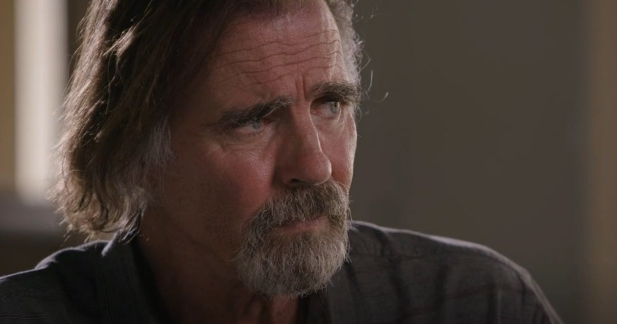 Jeff Fahey looking at Trace Adkins in Maneater