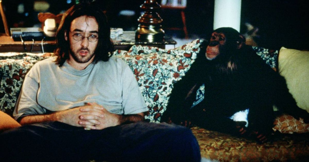 John Cusack with a monkey in Being John Malkovich.