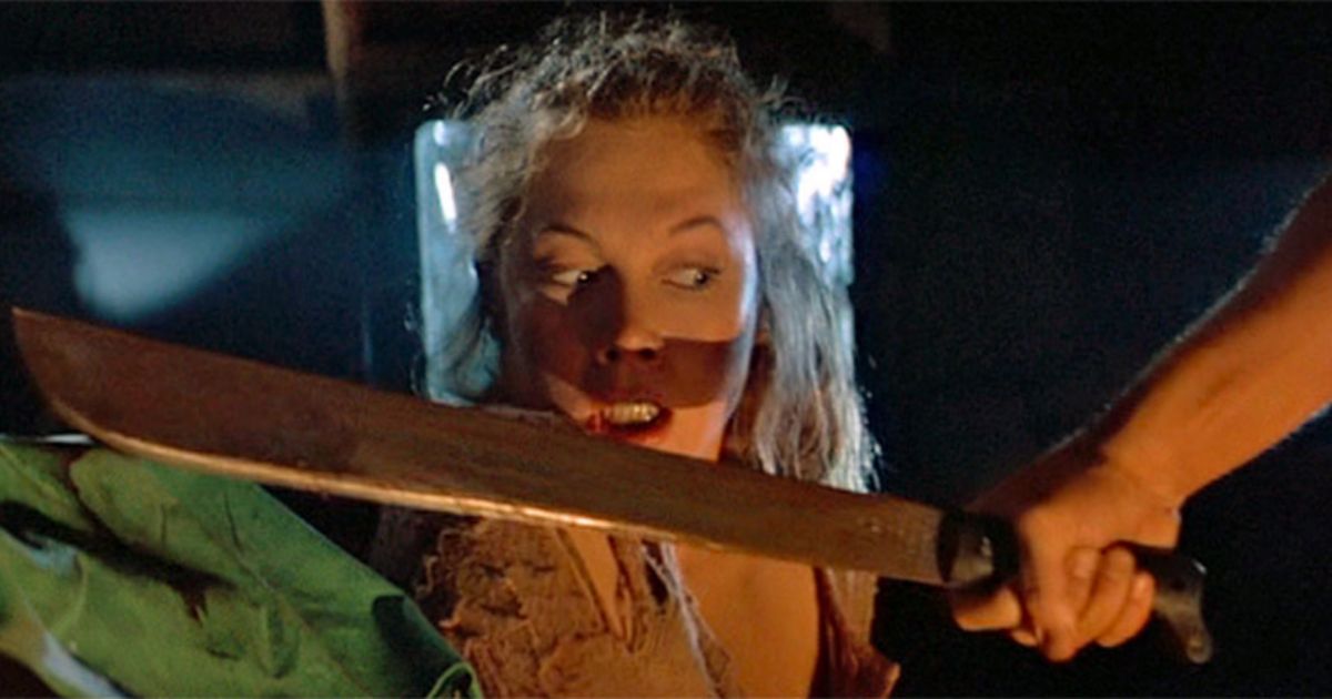 Kathleen Turner and a machete in Romancing the Stone