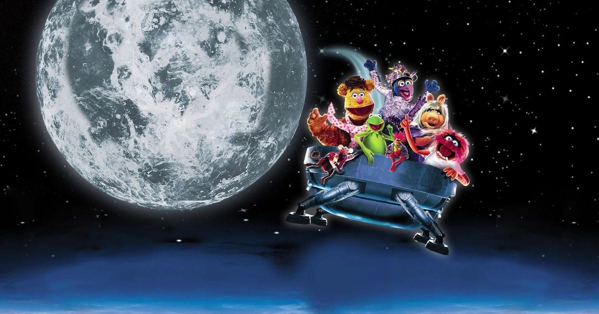Muppets From Space flying by the moon