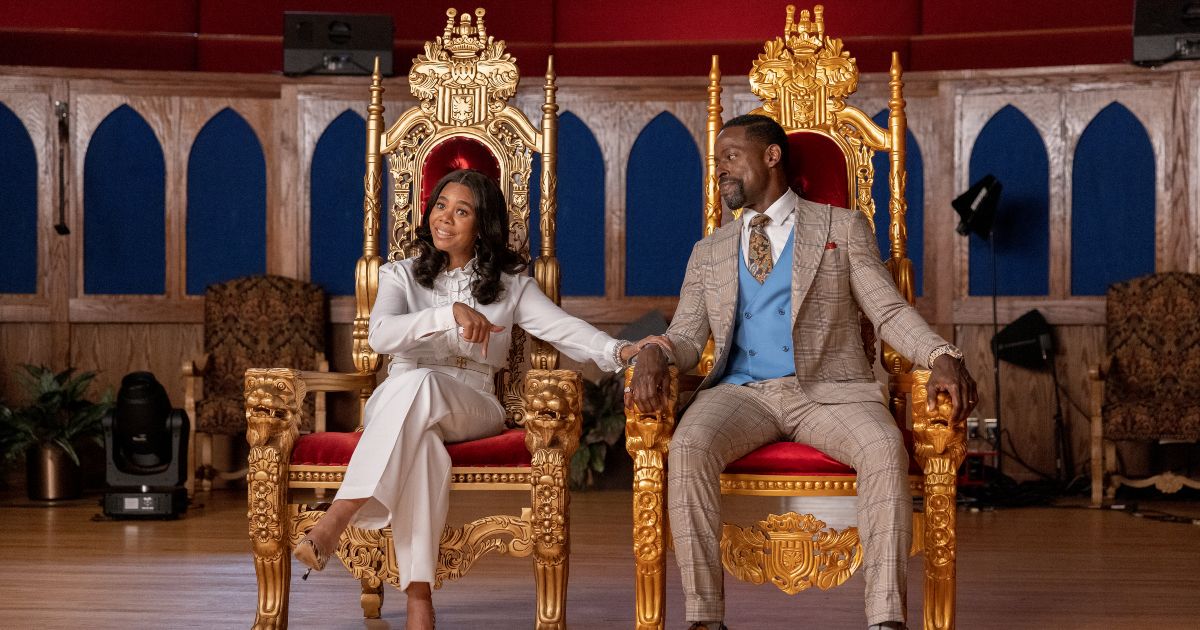 Regina Hall and Sterling K. Brown sit in giant thrones in the comedy movie Honk For Jesus Save Your Soul