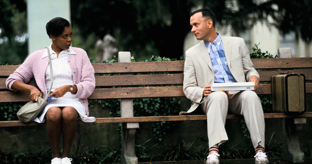 Forrest (Tom Hanks) talks to nurse at park