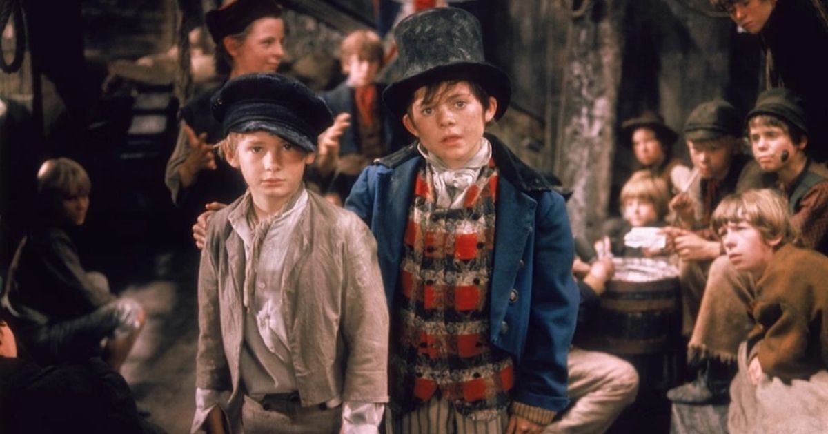 A group of kids in tattered clothes in Oliver