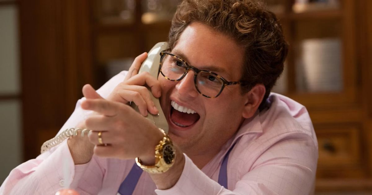 Jonah Hill answers the phone with a coked-up laugh in Wolf of Wall Street