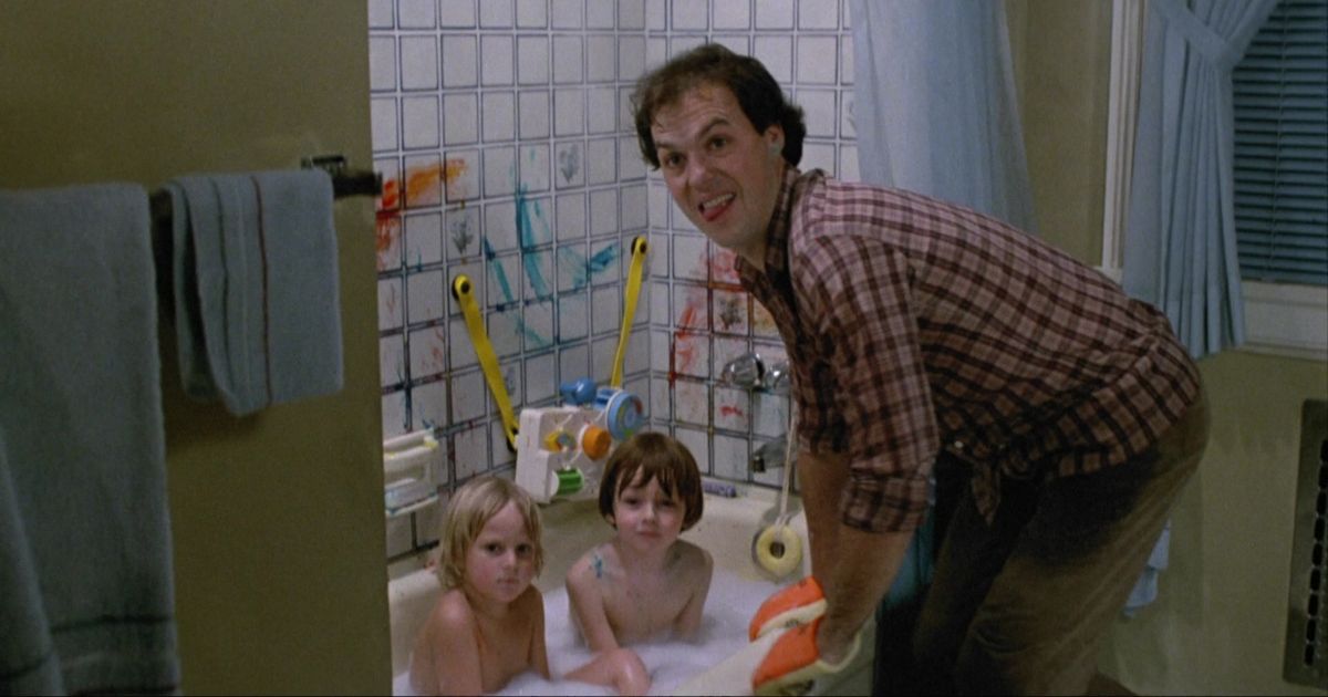 Michael Keaton in Mr. Mom with two kids in the tub