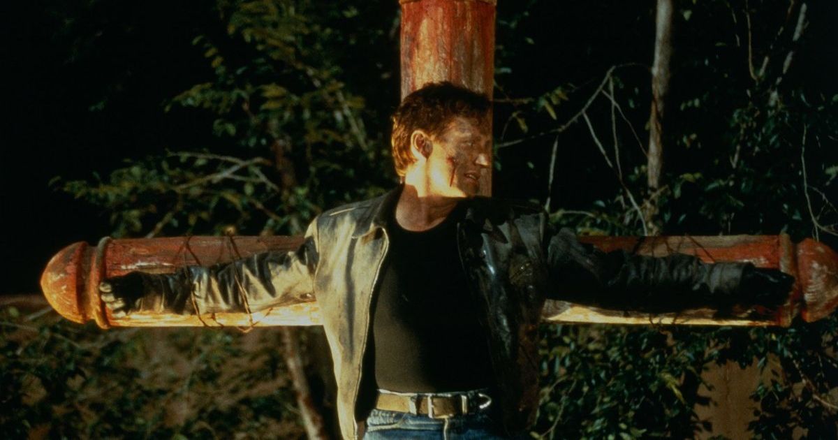 A man tied to a wooden cross in John Carpenter's Vampires