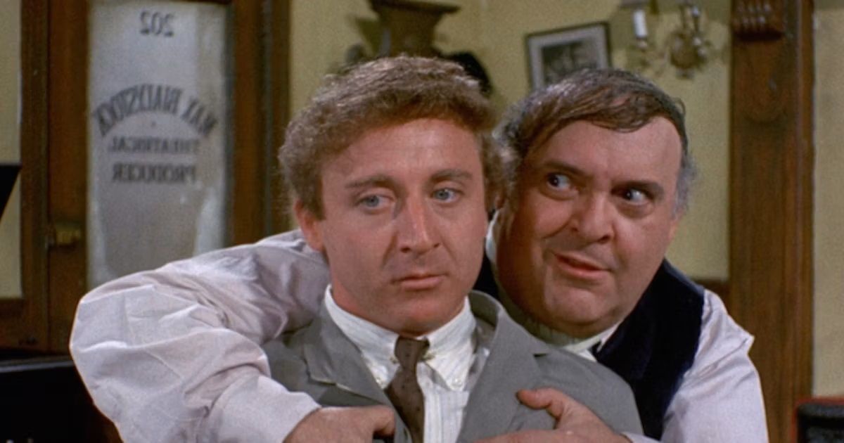 Zero Mostel hovers over Gene Wilder in The Producers