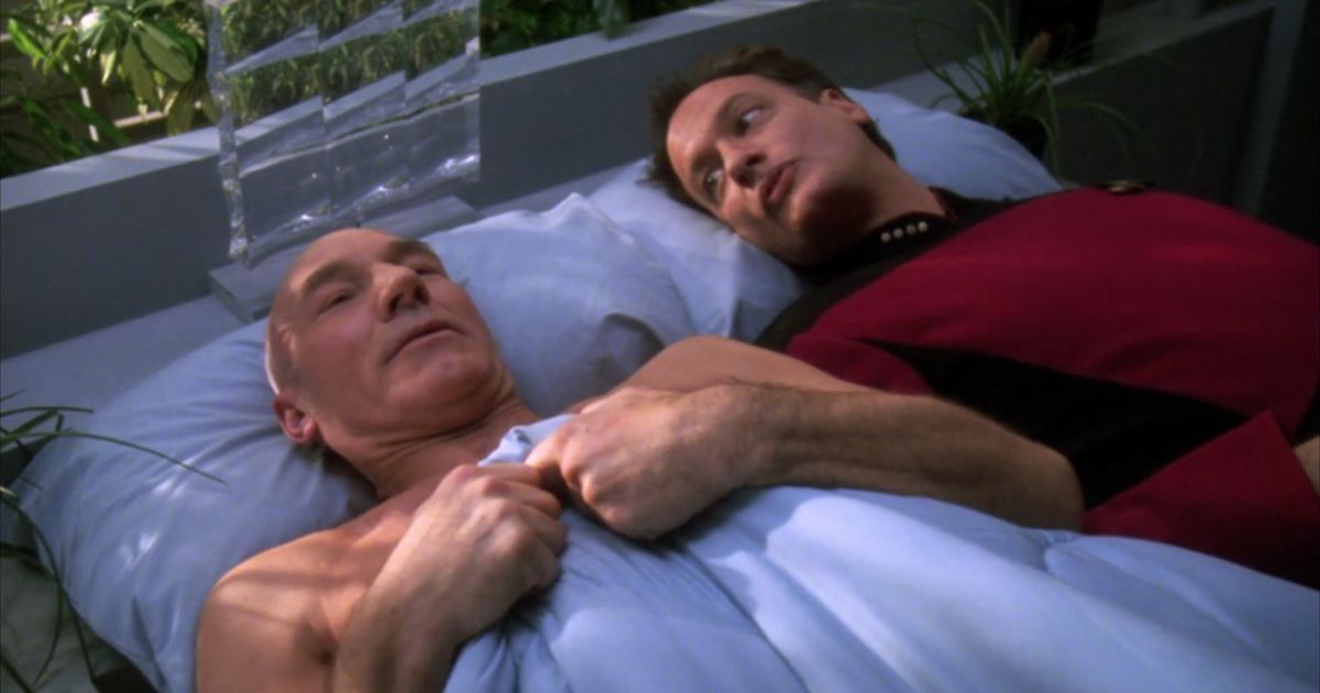 Picard wakes up with Q next to him