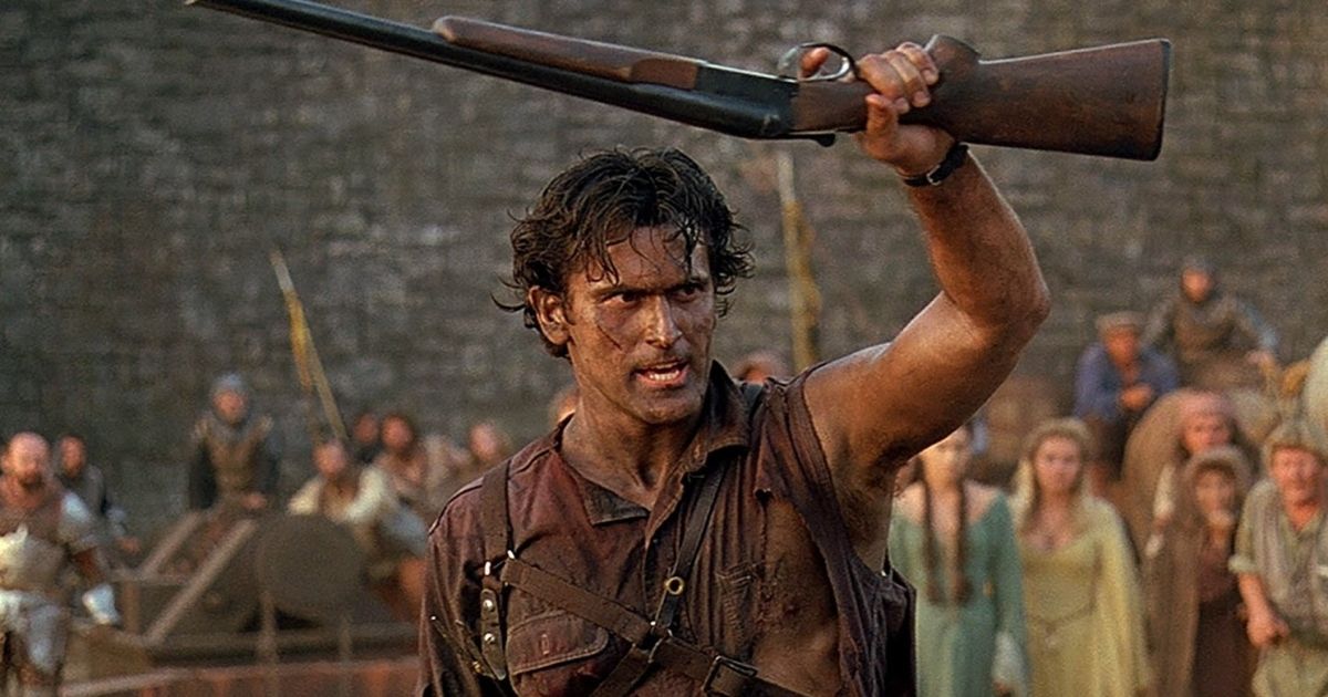 Bruce Campbell holds up a gun in Army of Darkness