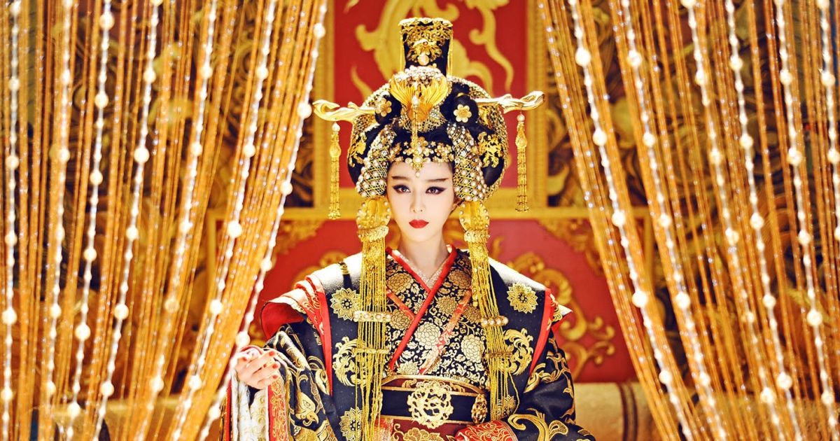 Empress of China sits on a gilded throne.
