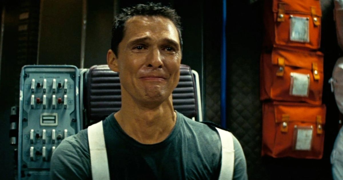 Matthew McConaughey as Cooper, crying in a scene from Christopher Nolan's Interstellar