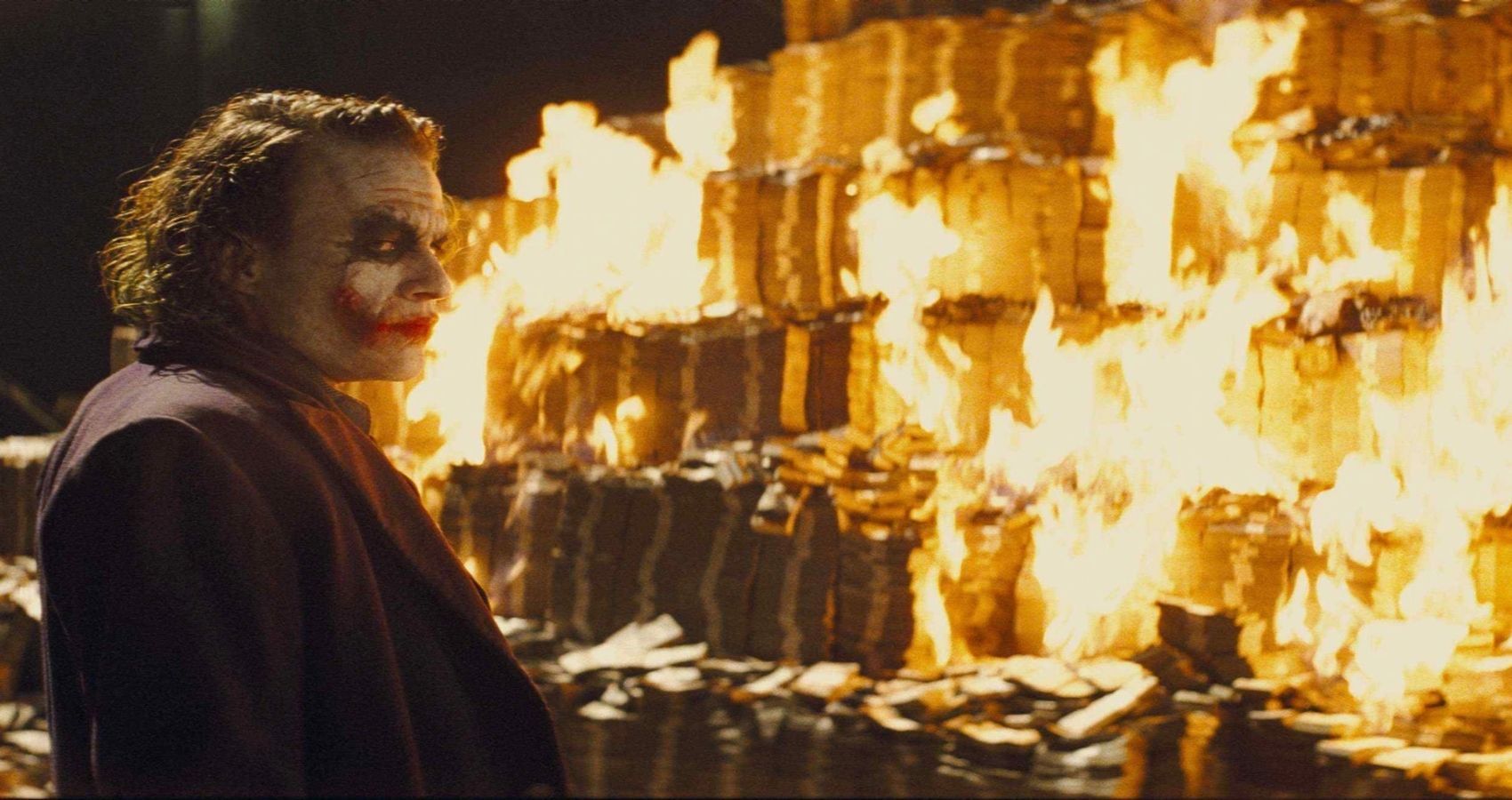 The Joker burning cash in The Dark Knight