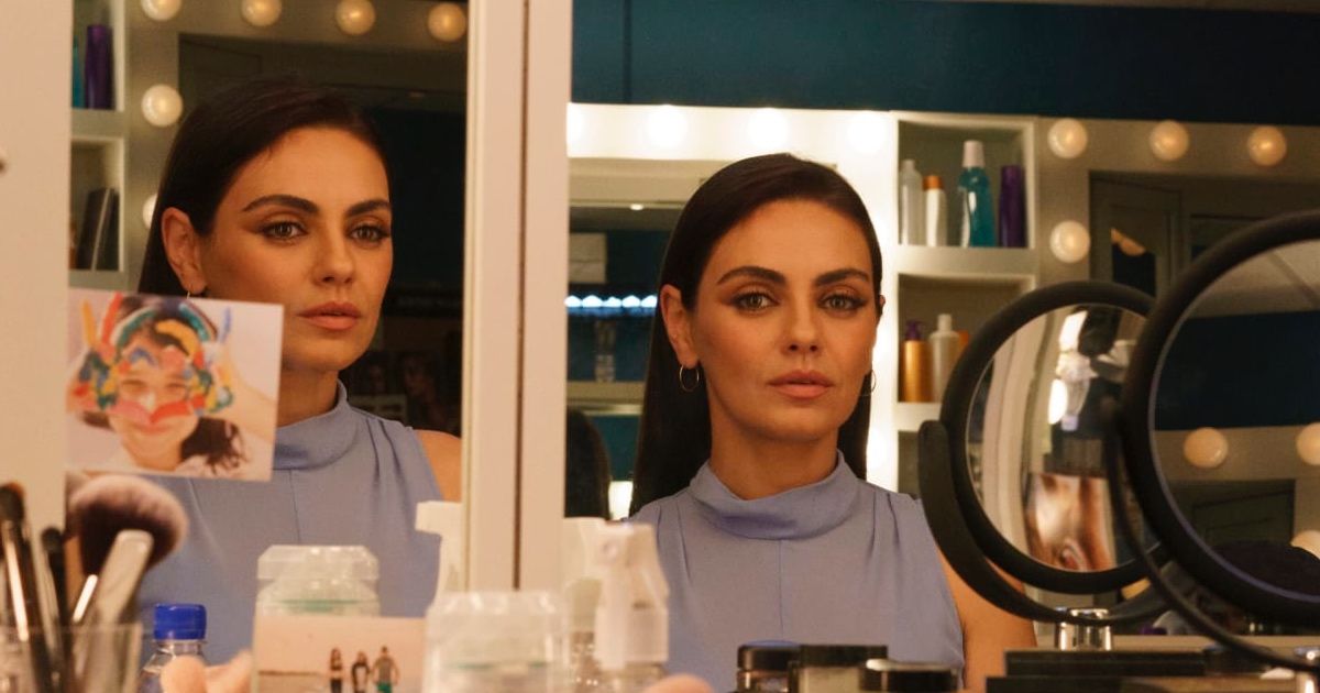 TifAni “Ani” Fanelli looks at herself in makeup mirror.