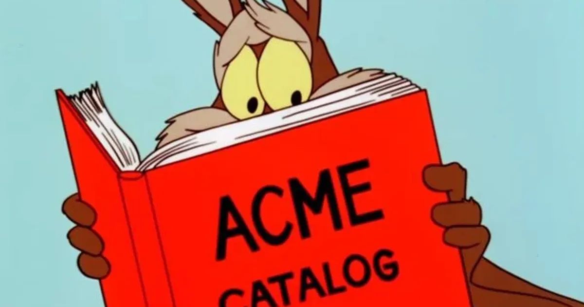 Wile E Coyote reading a large book titled 