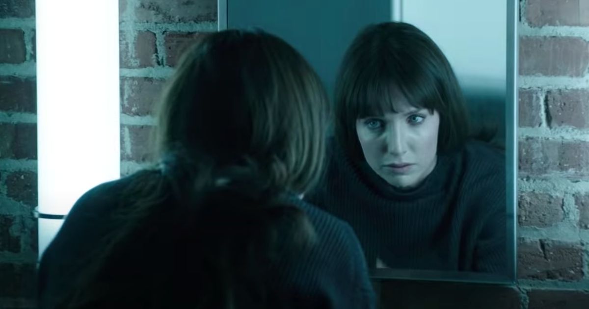 A still from Malignant with Maddy looking in the mirror