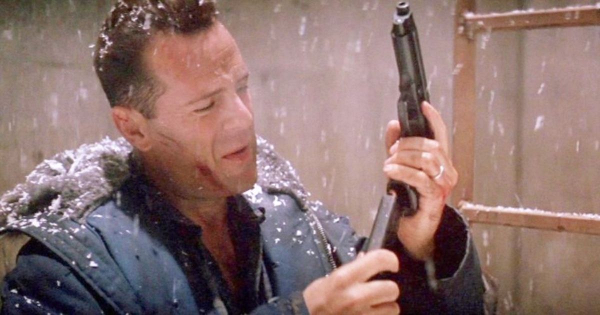 John McClane refilling his gun