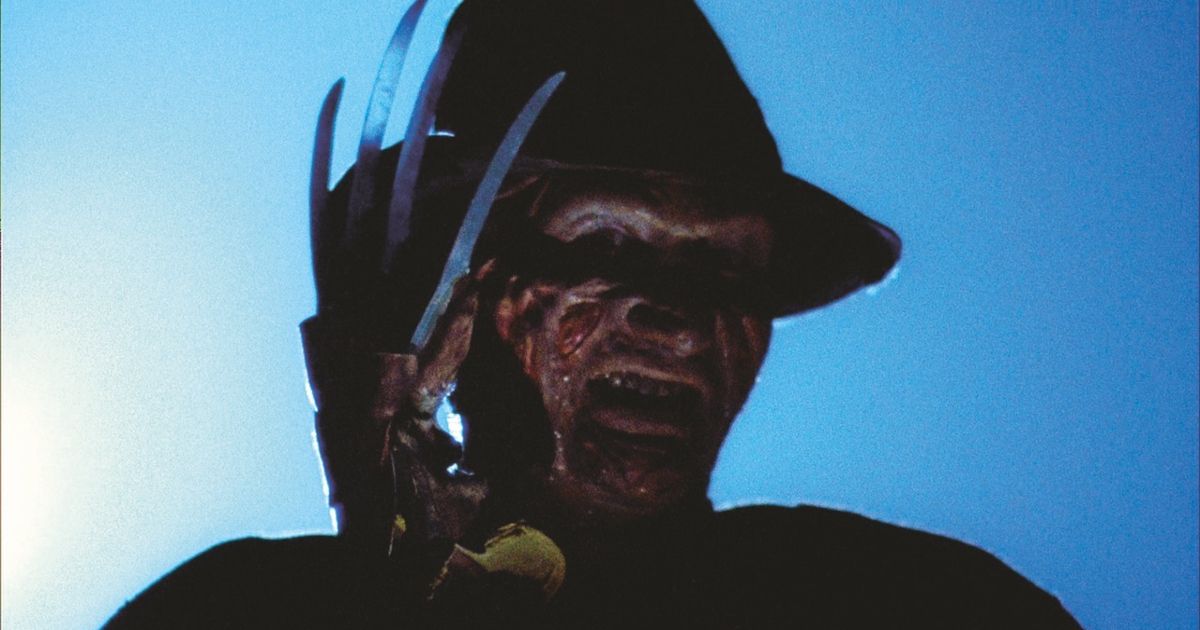 Freddy Krueger smiles in a still from A Nightmare on Elm Street