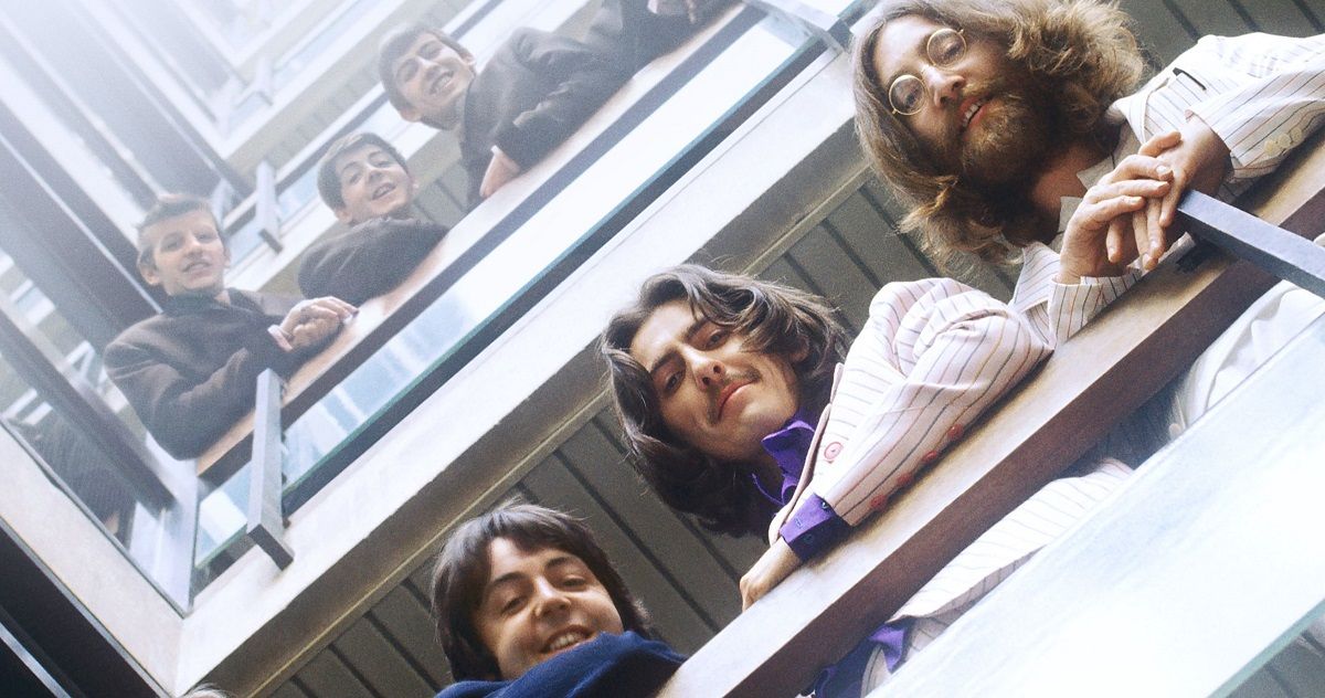 The Beatles, both young and old versions of them, look down at a camera in Get Back from Peter Jackson.