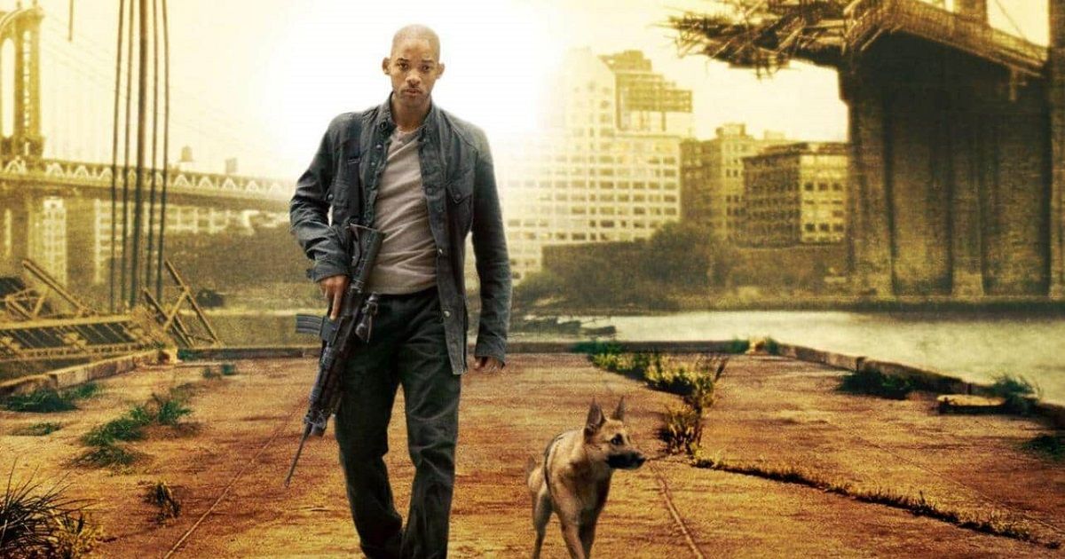 A man with a gun walking with a dog