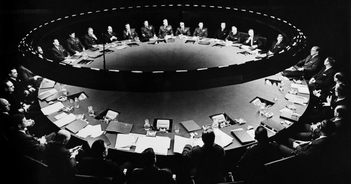 Dr. Strangelove's Council of War trying to stop the bomb being dropped