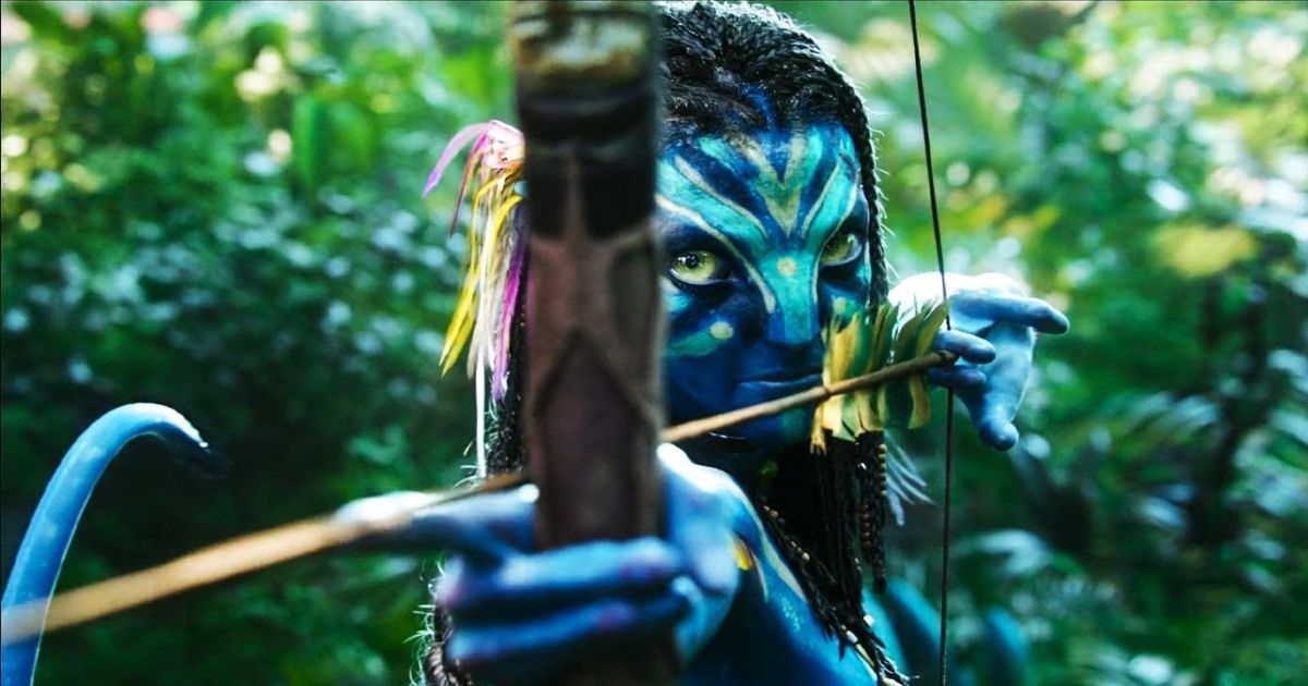 A Na'vi holds a bow and arrow in James Cameron's Avatar