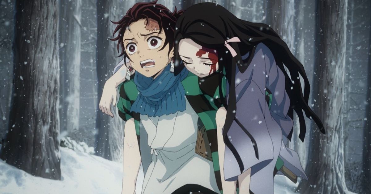 Tanjiro carrying his sister, Nezuko.