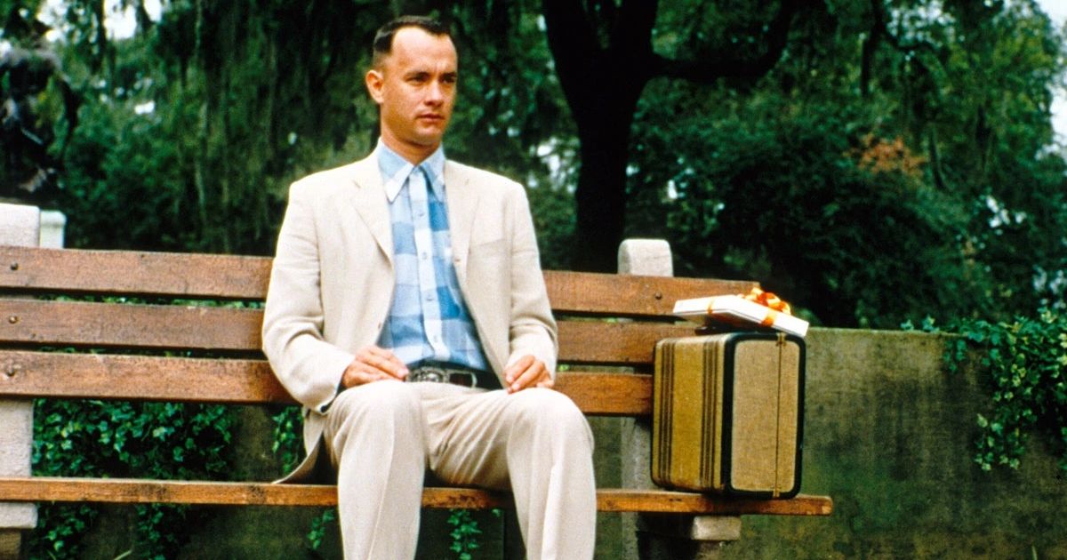 Tom Hanks as Forrest Gump on a park bench