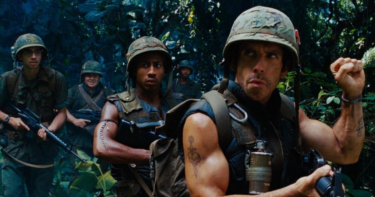 Some of the cast of Tropic Thunder trecking through the forest in military gear