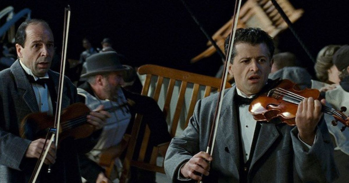 Musicians play while the ship sinks in the 1997 epic romance and disaster film Titanic