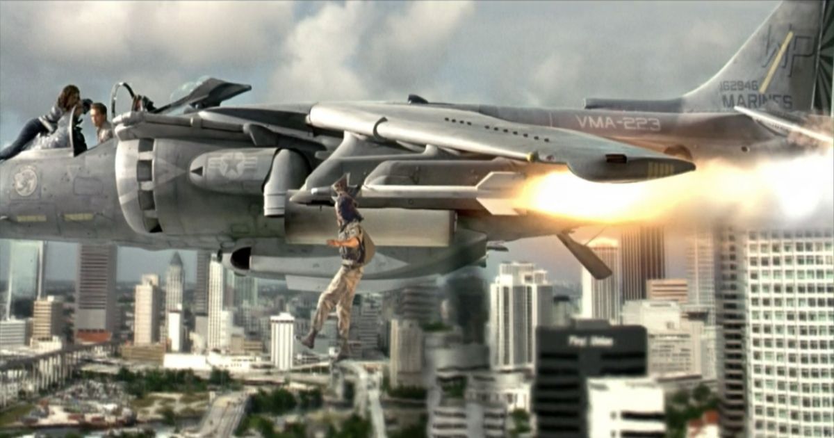 A man dangles from a jet in james cameron's true lies