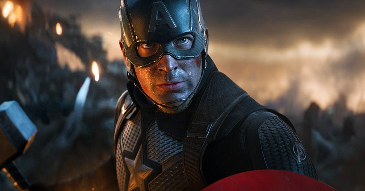 Chris Evans as Captain America holding Thor's hammer in Avengers: Endgame