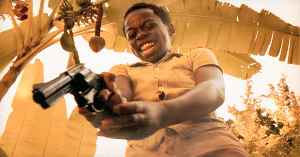 A child with a revolver in his hand in the movie City of God