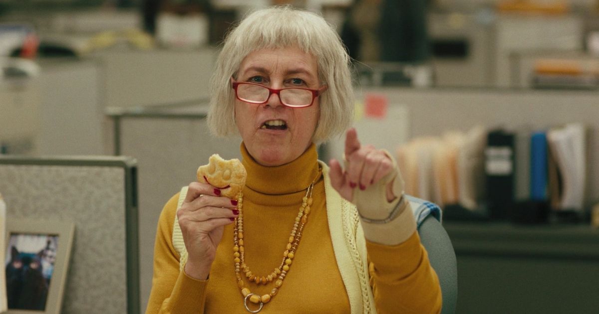 Jamie Lee Curtis eating cookie in Everything Everywhere All at Once