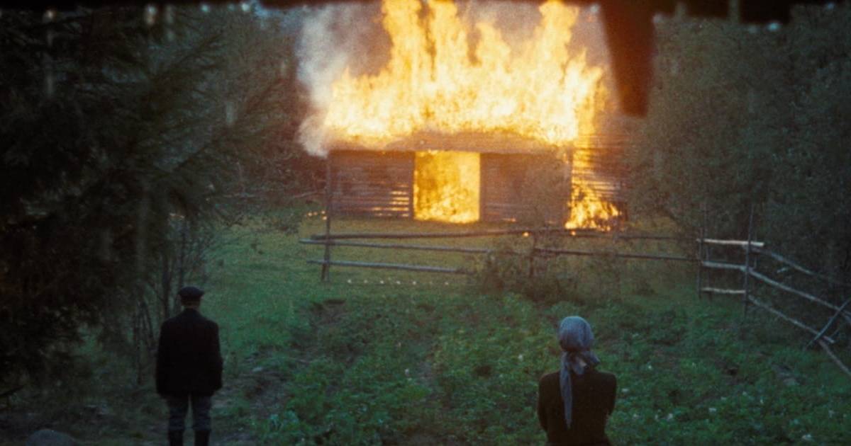 Family watches barn burn