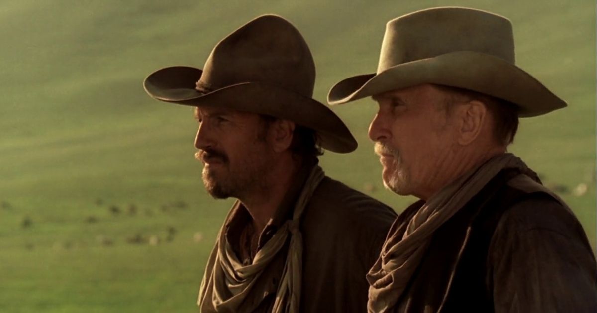 Two men standing in Open Range.