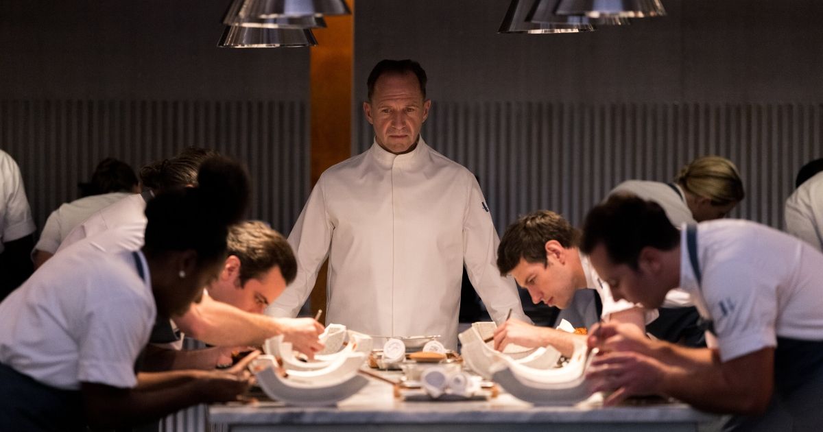 Chef Slowik watches his staff prepare the dishes.