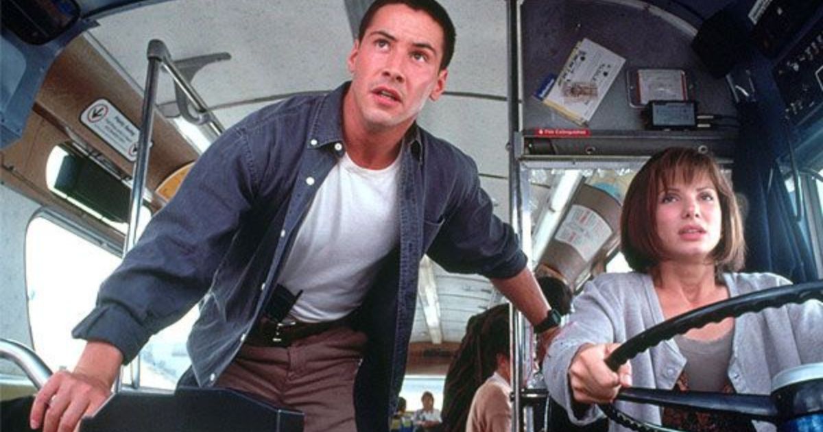 Keanu Reeves and Sandra Bullock on a bus in Speed (1994)
