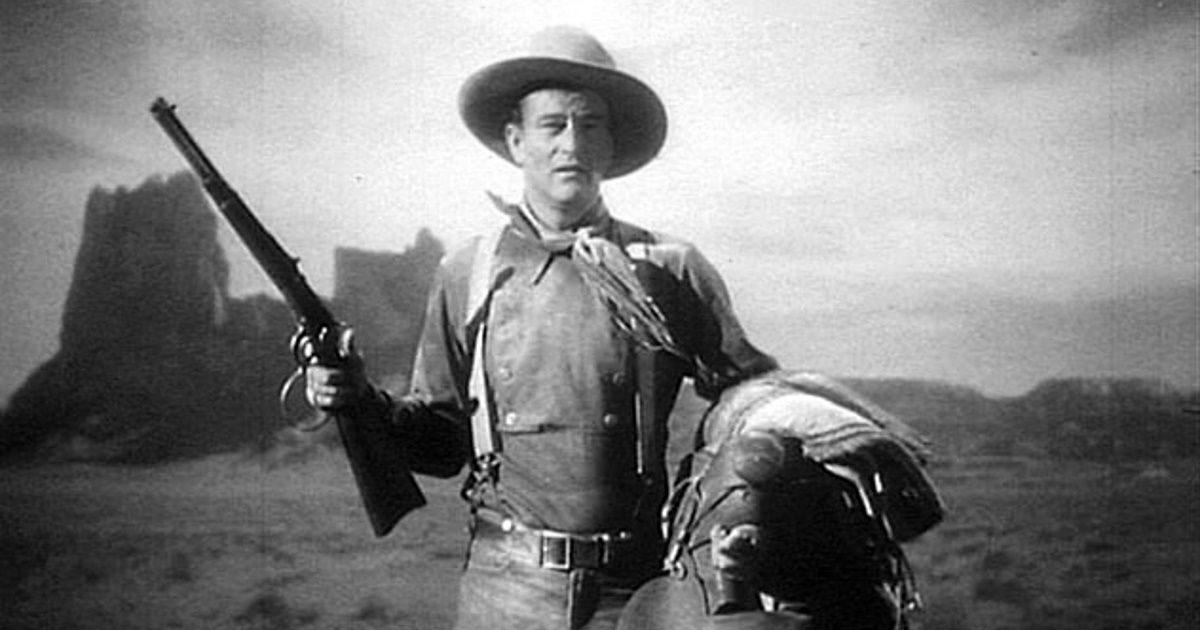 John Wayne (in western attire) as The Ringo Kid in John Ford's 1939 film Stagecoach.