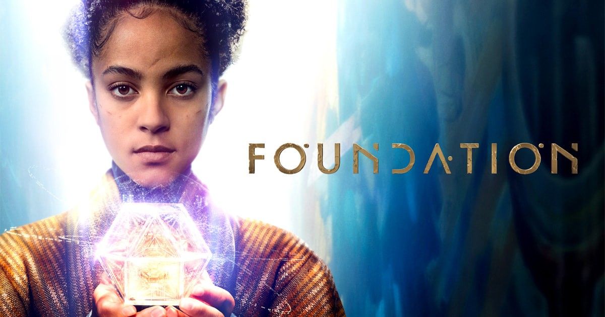Apple TV Foundation Second Season advertisement showing girl holding glowing cube. 