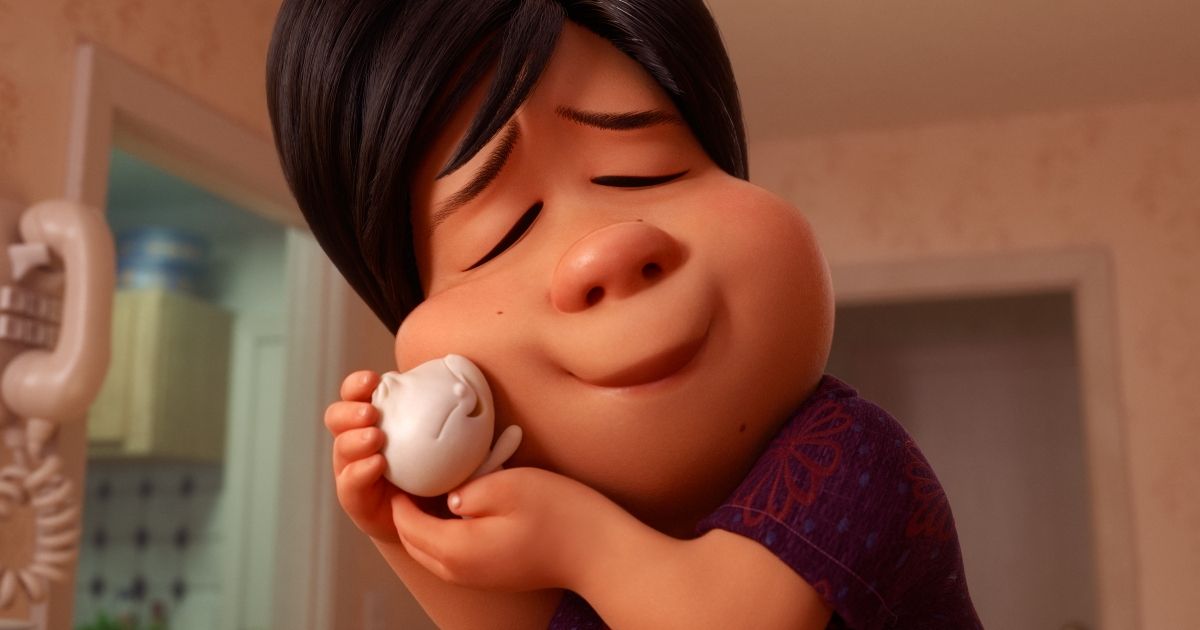 A woman hugging the steamed bun that came to life in Bao