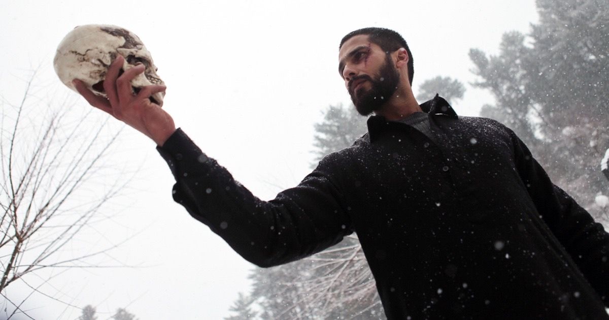 Shahid Kapoor looks at a skull in Haider