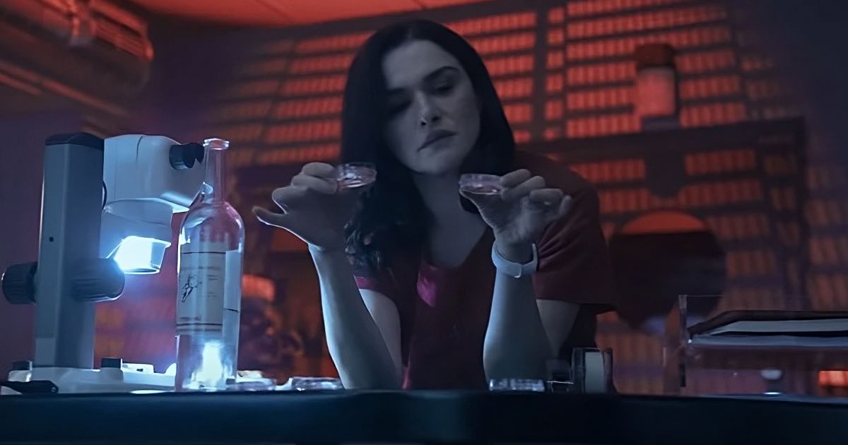 Rachel Weisz sitting in a lab in Dead Ringers (2023)