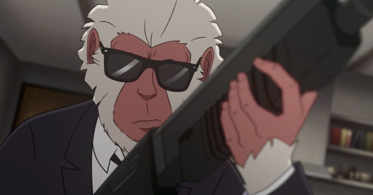 Hit-Monkey loading a shotgun in his signature suit and glasses from Hulu's Hit-Monkey.