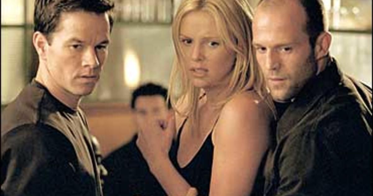 Mark Wahlberg, Charlize Theron e Jason Statham em O Trabalho Italiano